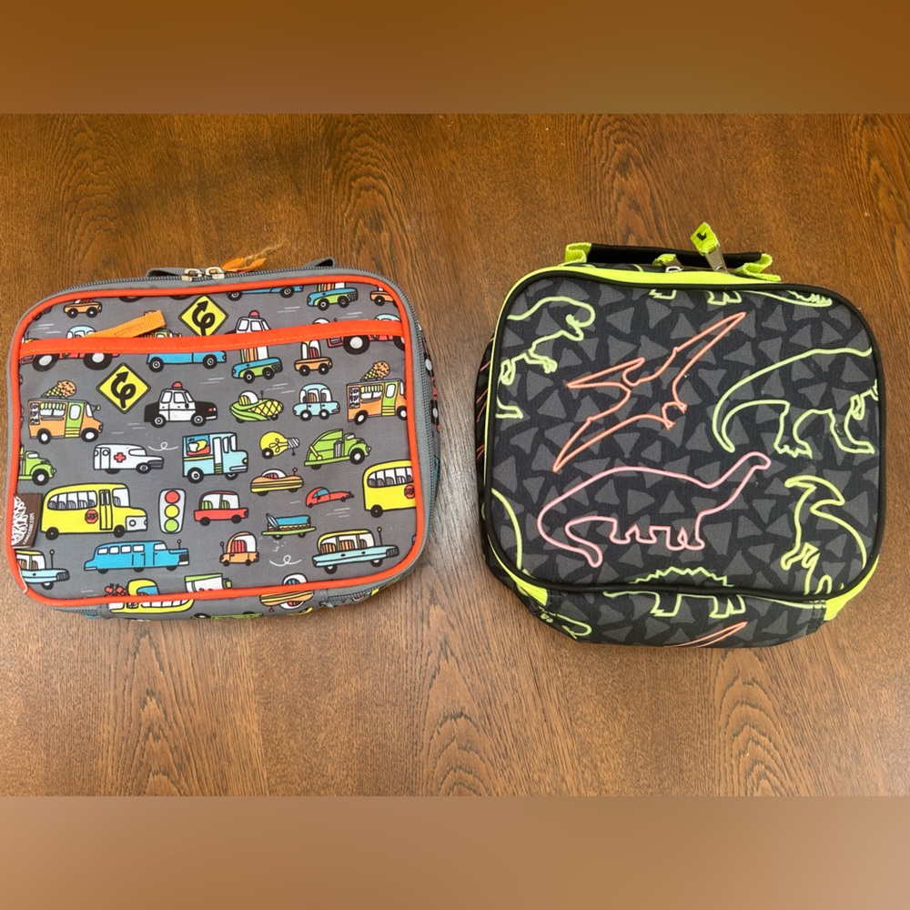 Two(2) insulated padded lunchboxes, dinosaurs & cars. Preowned, lots life left!